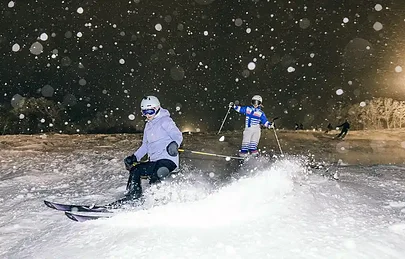 SurfYogaBeer night skiing under the lights in Niseko