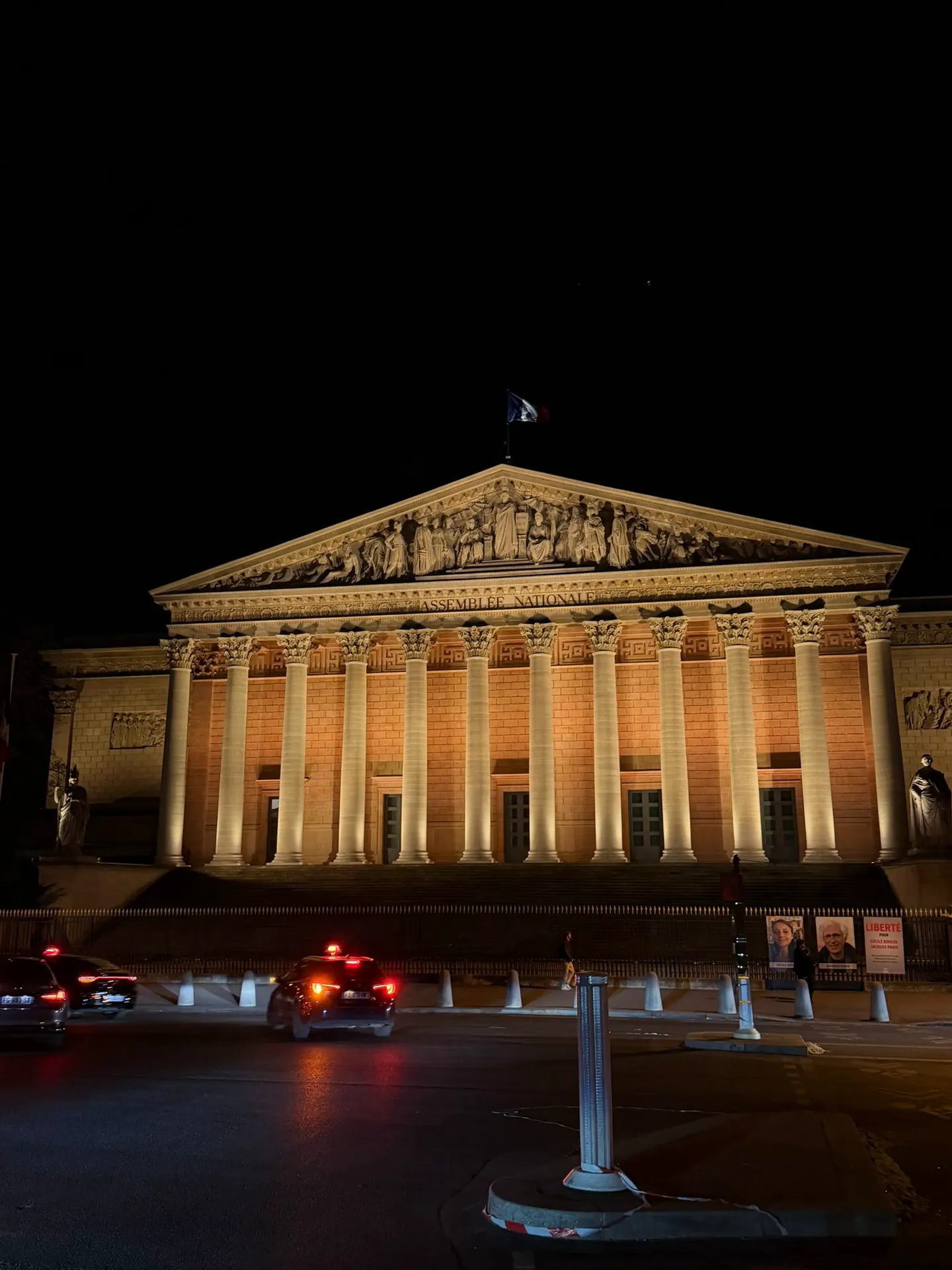 The Assemblee Nationale lit up at night in Paris ahead of the Paris Marathon with Hardest Adventures.