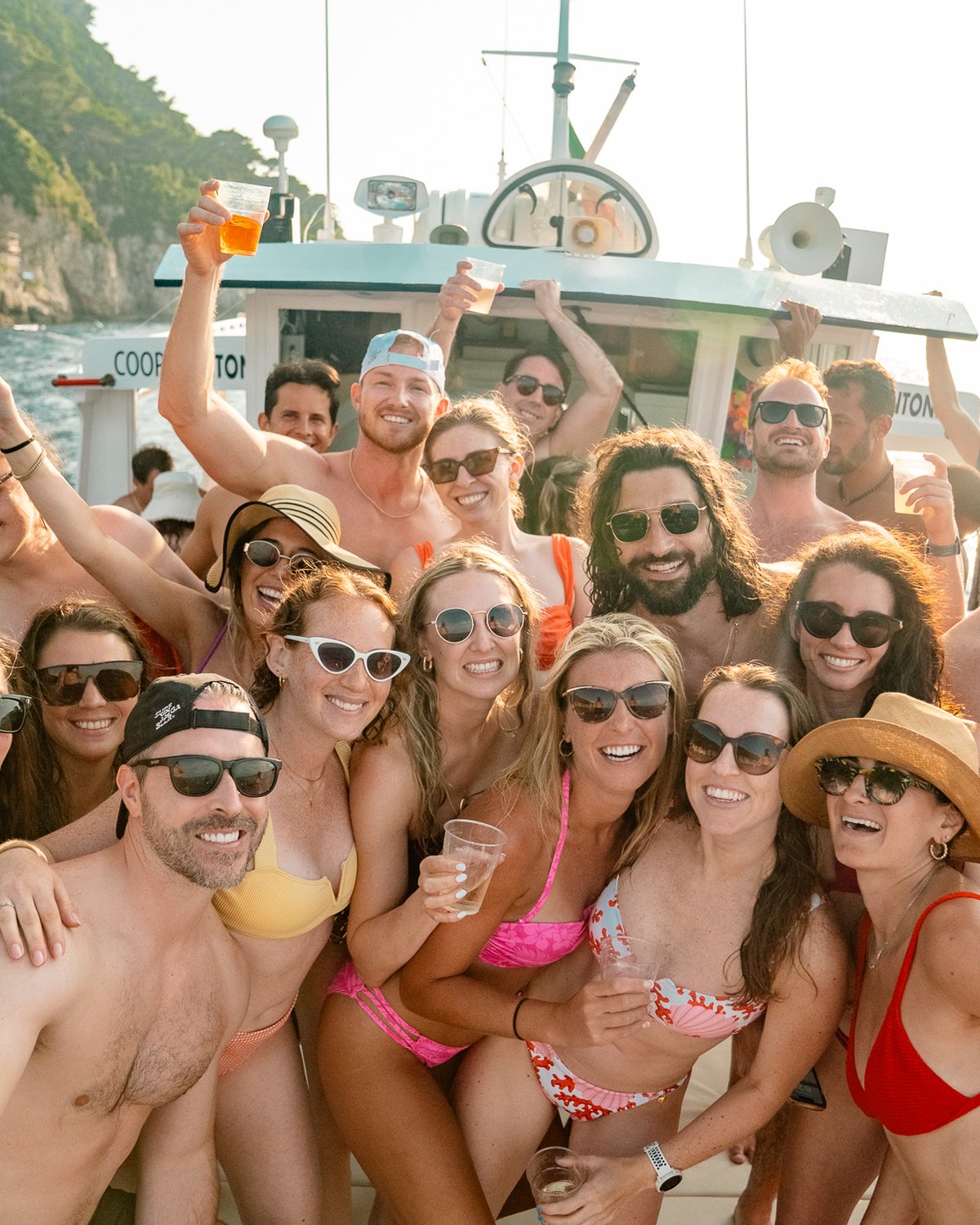 SurfYogaBeer group on a private boat along the Amalfi Coast