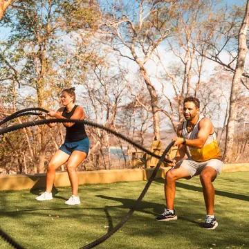 Battle rope workout on the lawn on the SYB Nicaragua Surf Camp trip