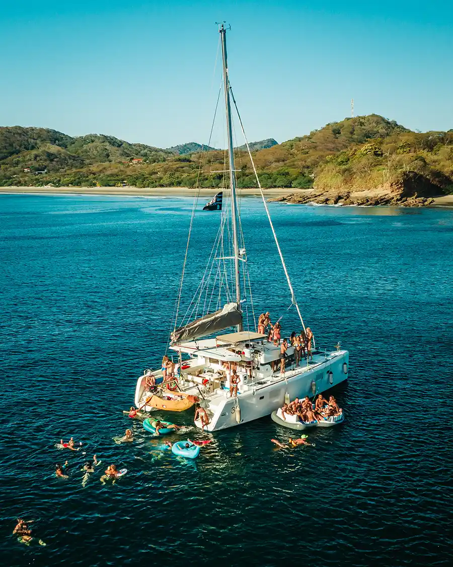 Catamaran anchored in turquoise water off the Nicaraguan coast