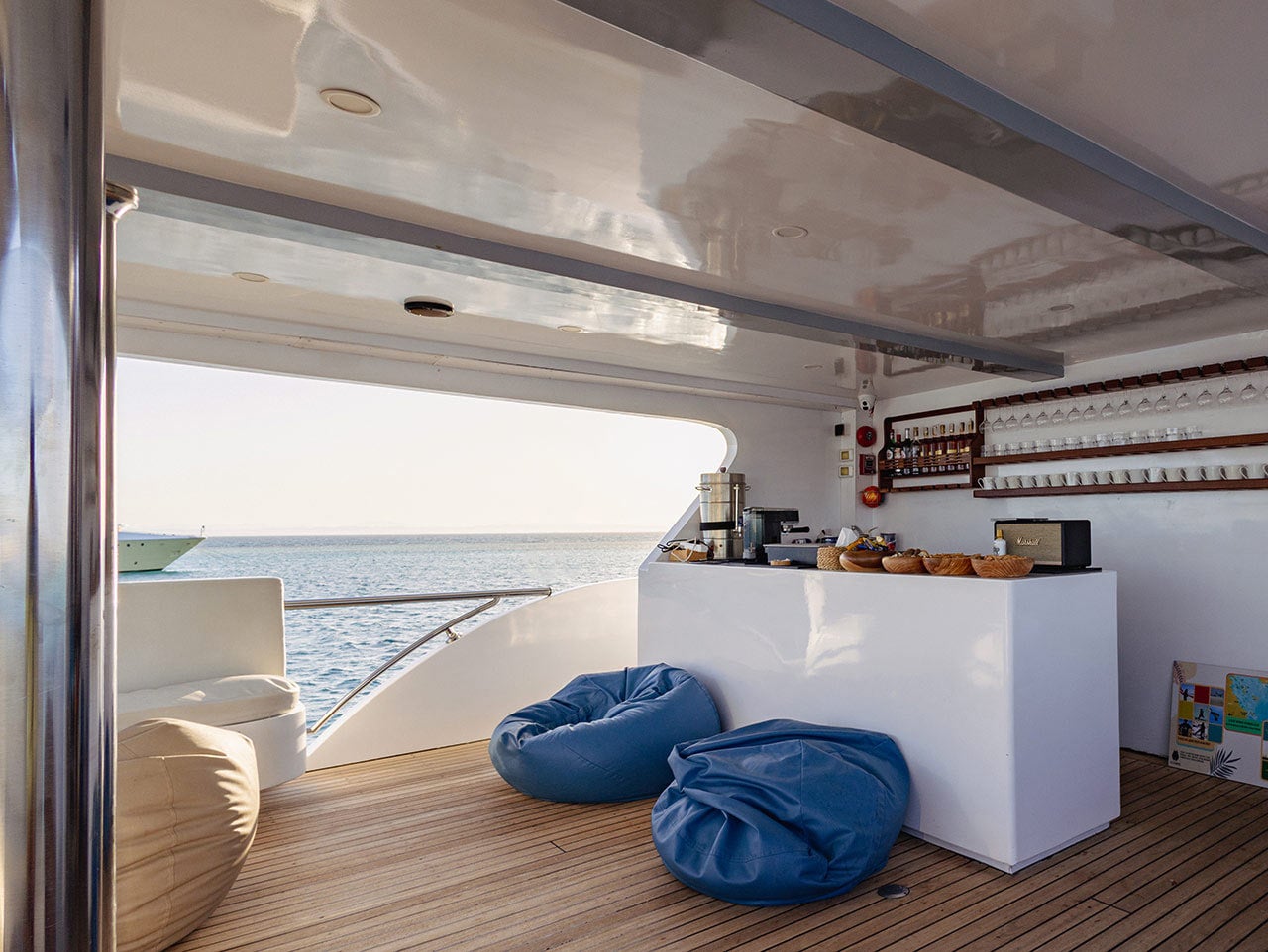 The main deck bar with beanbags and a sea view