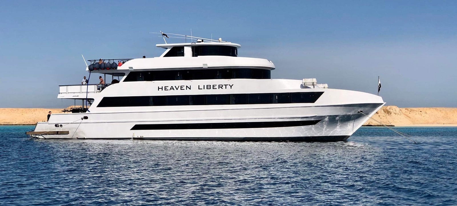 Heaven Liberty anchored in turquoise Red Sea water