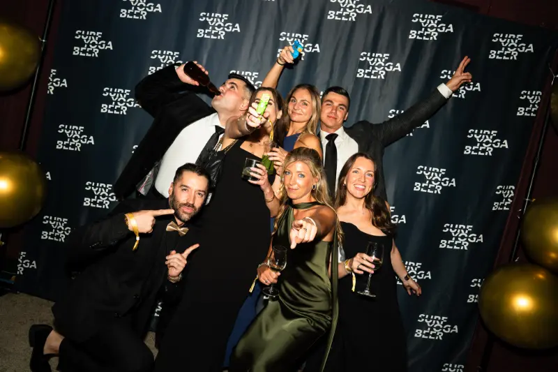 A happy pile-up at the photo wall