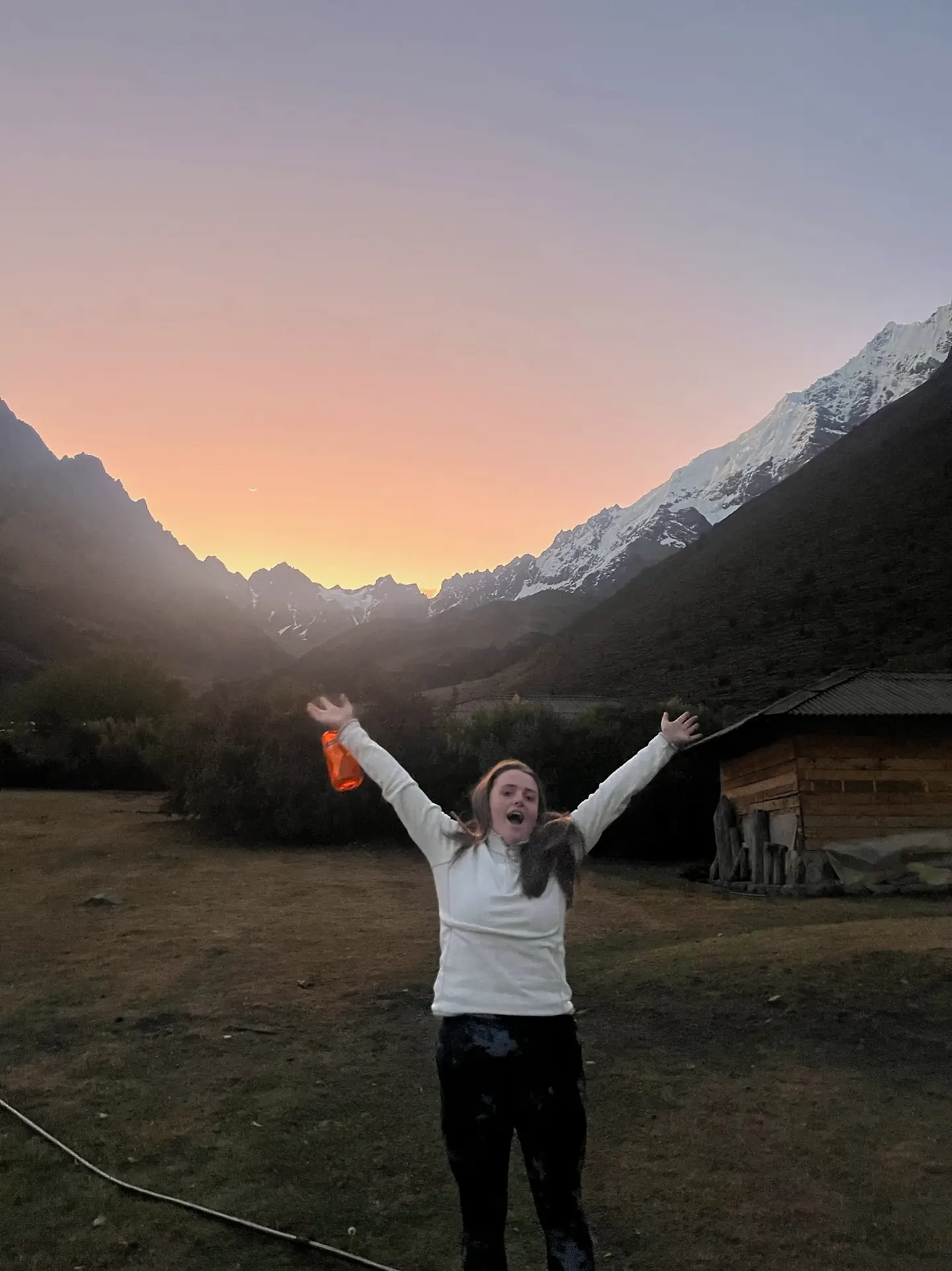 Sunrise over the mountains at Soraypampa on the Salkantay trek to Machu Picchu with Hardest Adventures.