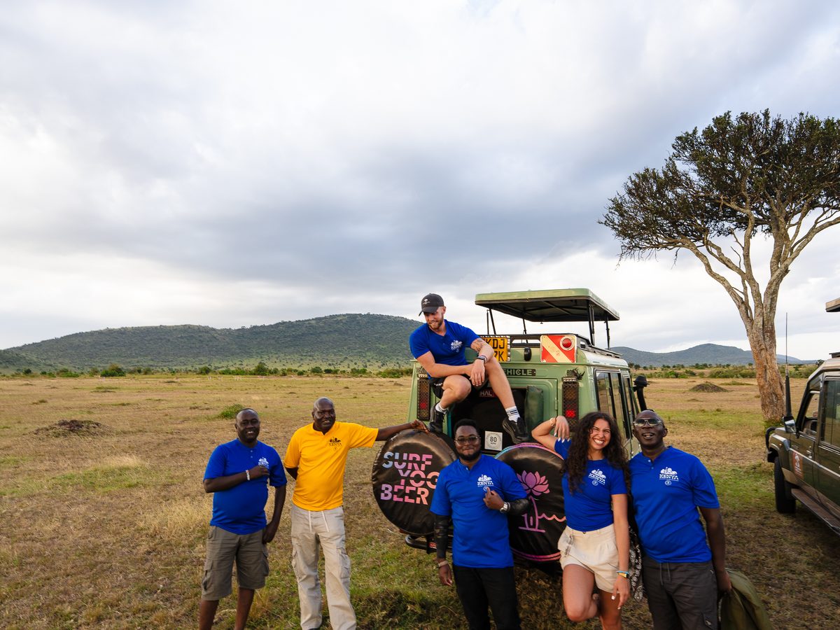 SurfYogaBeer crew on safari jeeps in Kenya