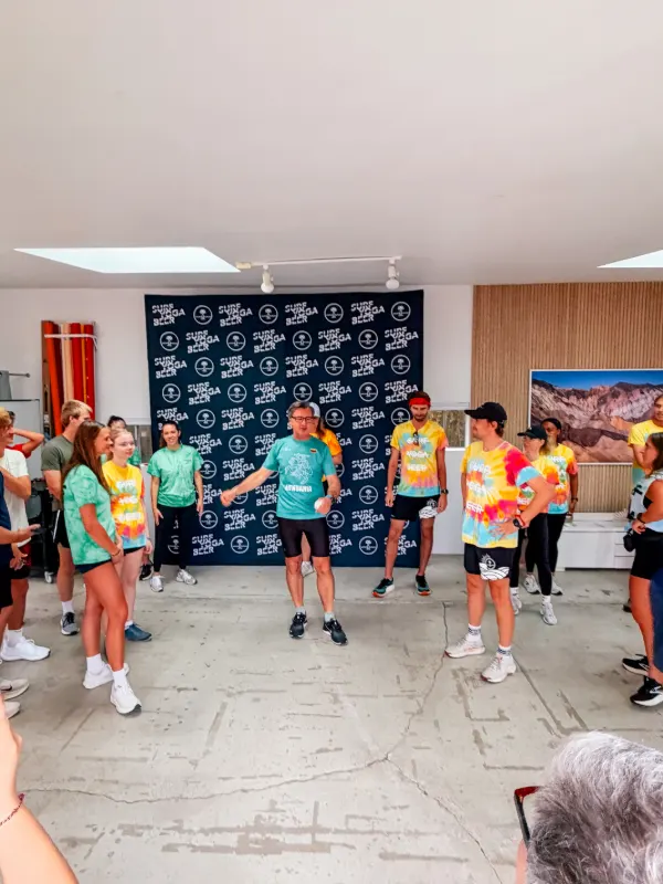 Warming up together inside Milwood Studios before the 5K