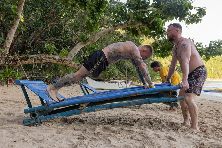 SurfYogaBeer beach bootcamp on the sand in Palawan