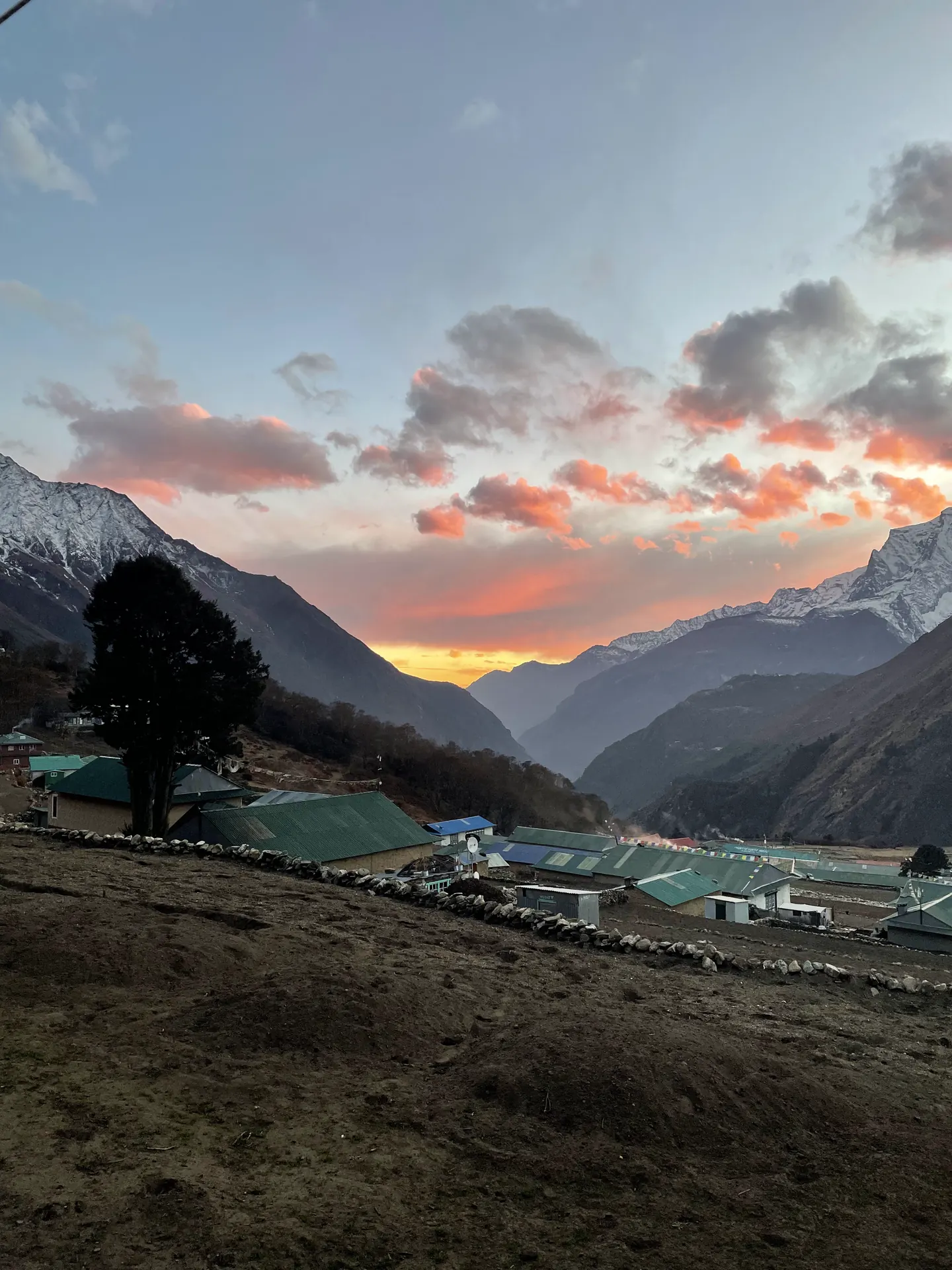 Sunset over Namche Bazaar in the Everest region on a Hardest Adventures trek to Everest Base Camp.