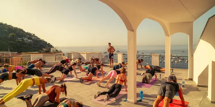 Golden hour group workout on the terrace on the SYB Amalfi Coast trip