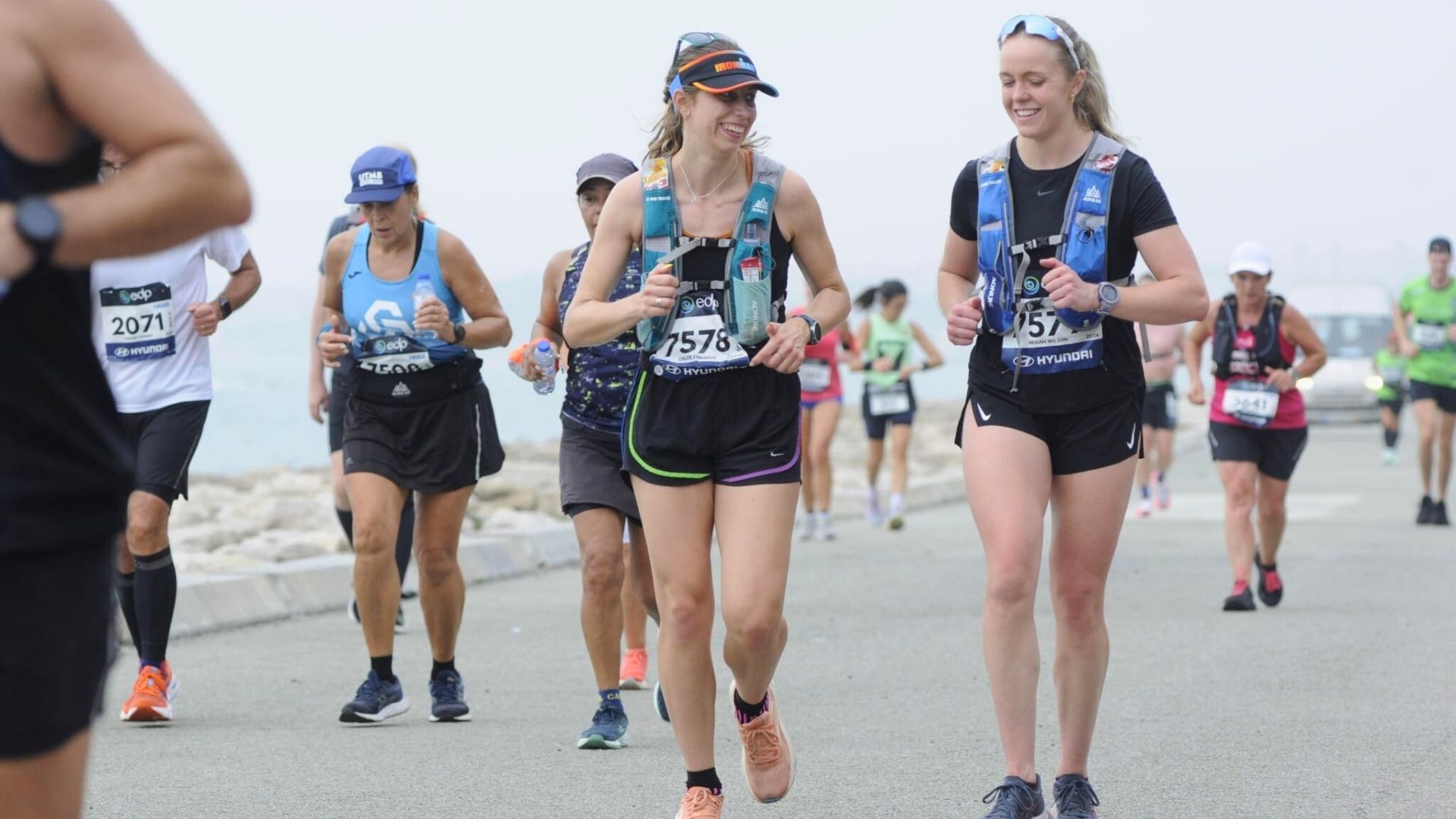 Two runners laughing