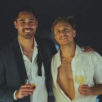 Two friends dressed up with drinks on a night out on the SYB Amalfi Coast trip