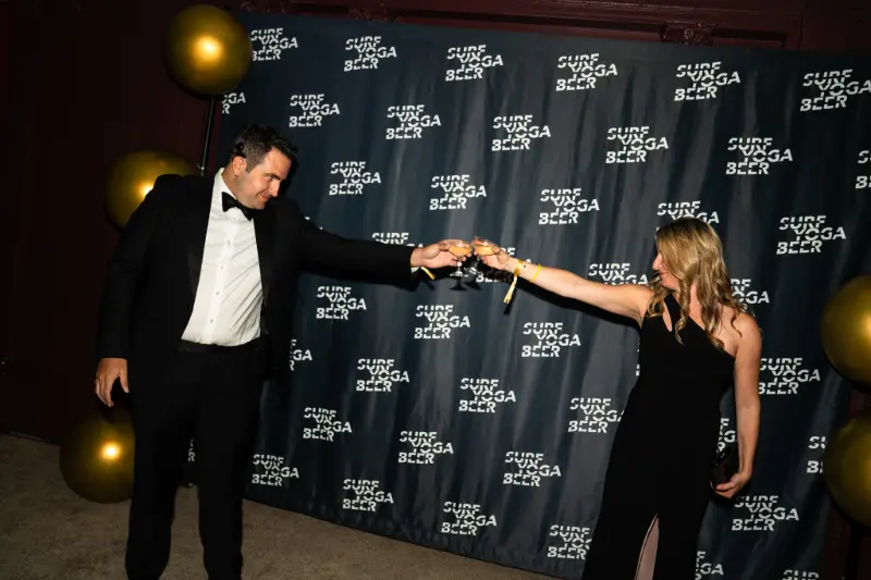 A playful pose at the photo wall