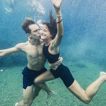 Underwater kiss in clear water on the SYB Croatia trip