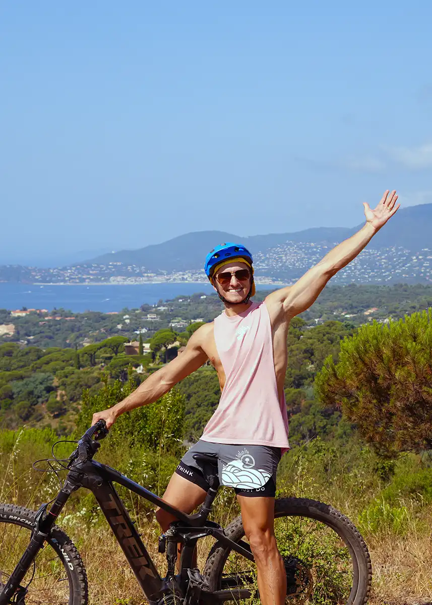 A SurfYogaBeer guest on a bike above the Saint-Tropez countryside