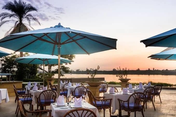 The Jolie Ville terrace restaurant on the Nile at sunset
