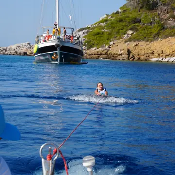 Getting towed behind the tender with the gulet in the background on the SYB Turkey trip