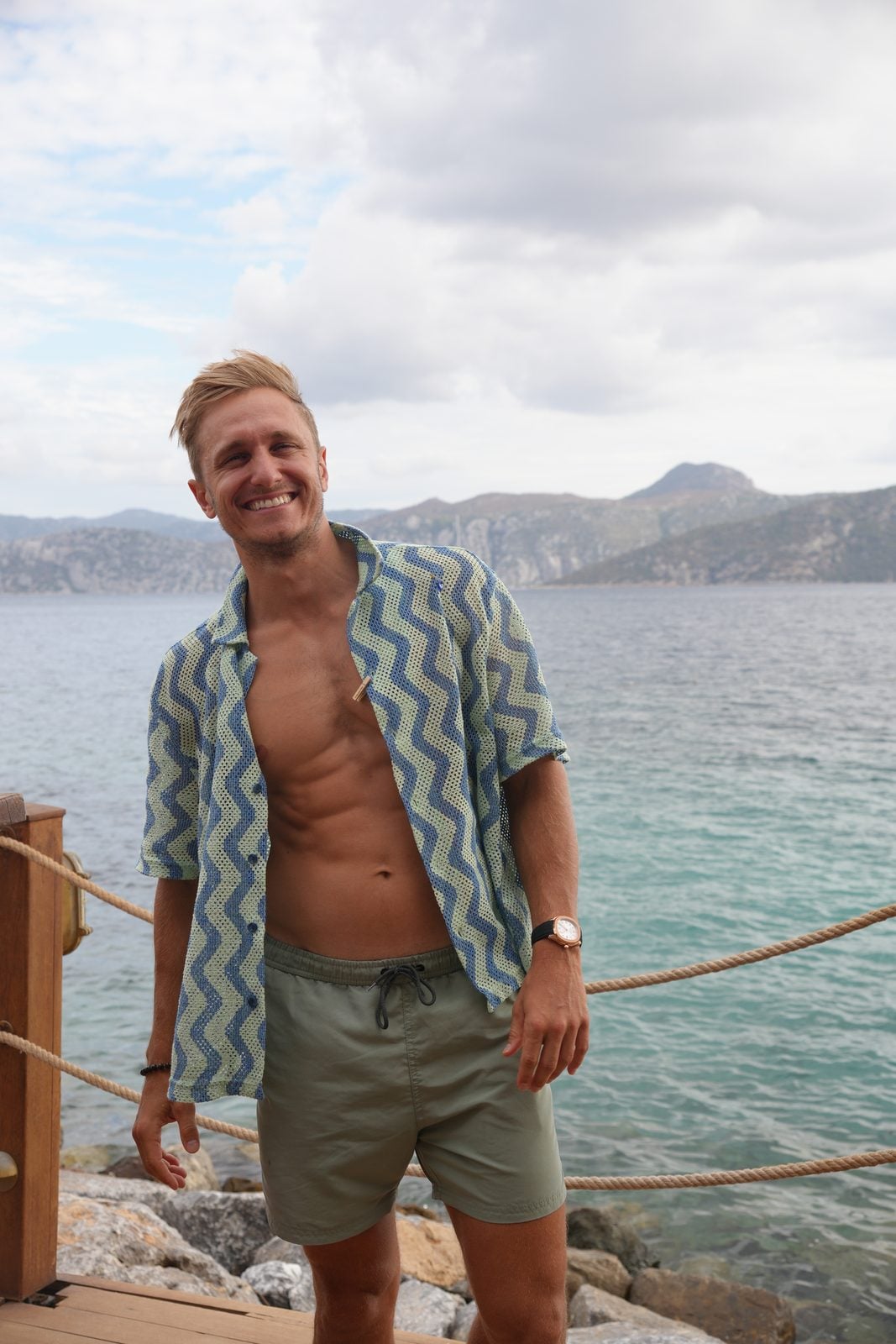 Mantas smiling by the sea in Turkey