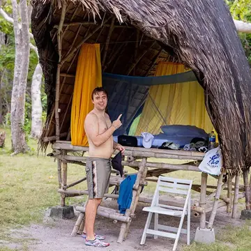Outside a thatched beach hut at the island camp on the SYB Philippines trip