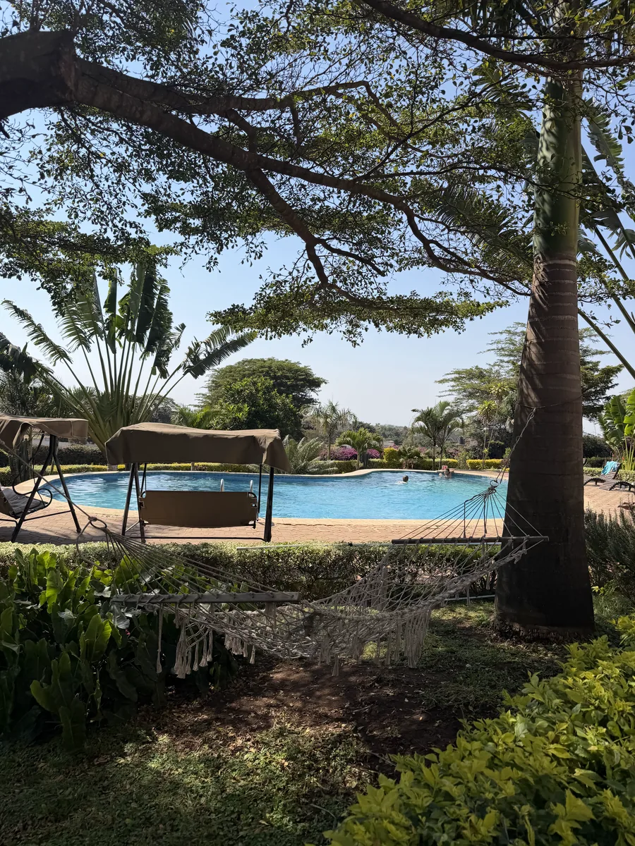 Relaxing in a hammock by the pool in Zanzibar on the final day of the extension trip