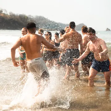 Running into the ocean together on the SYB Nicaragua trip