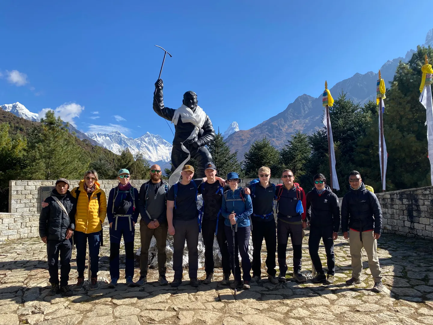 Hardest Adventures group beside the Hillary statue above Namche Bazaar on the Everest Base Camp trek.