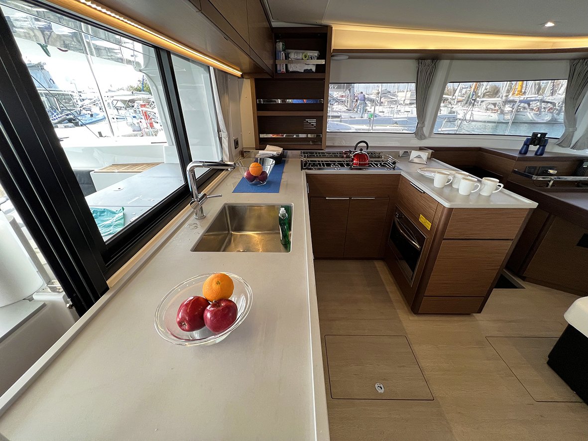 The galley kitchen with fridges