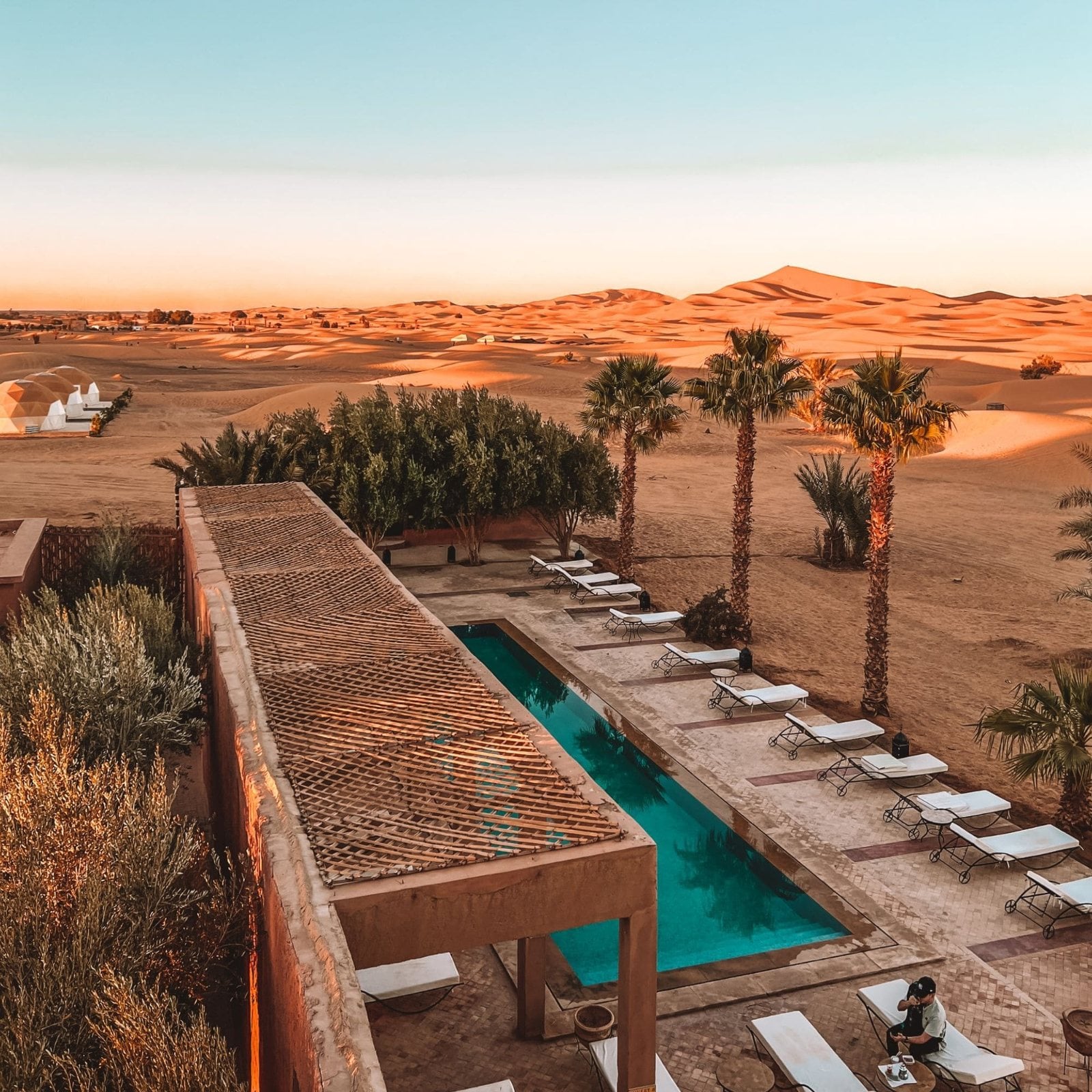 The pool at Kanz Erremal with the Erg Chebbi dunes behind it
