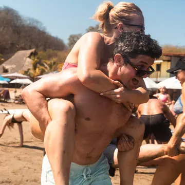 Piggyback race on the beach on the SYB Nicaragua trip