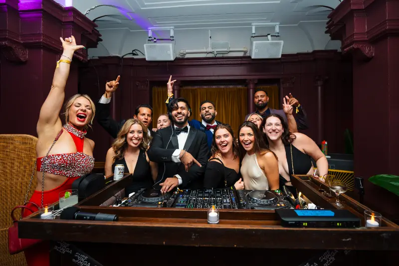 Dancing next to the DJ booth