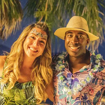 Two friends in tropical outfits for theme night on the SYB Croatia trip