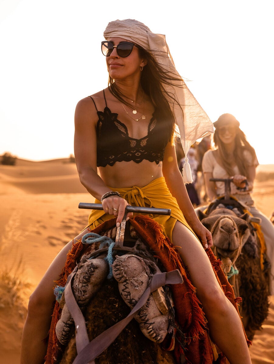 Riding a camel through the Sahara