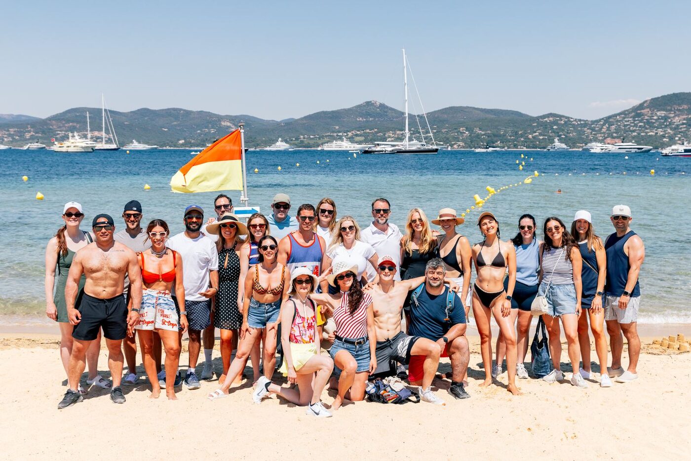 A big SYB group cheering on a beach in the South of France