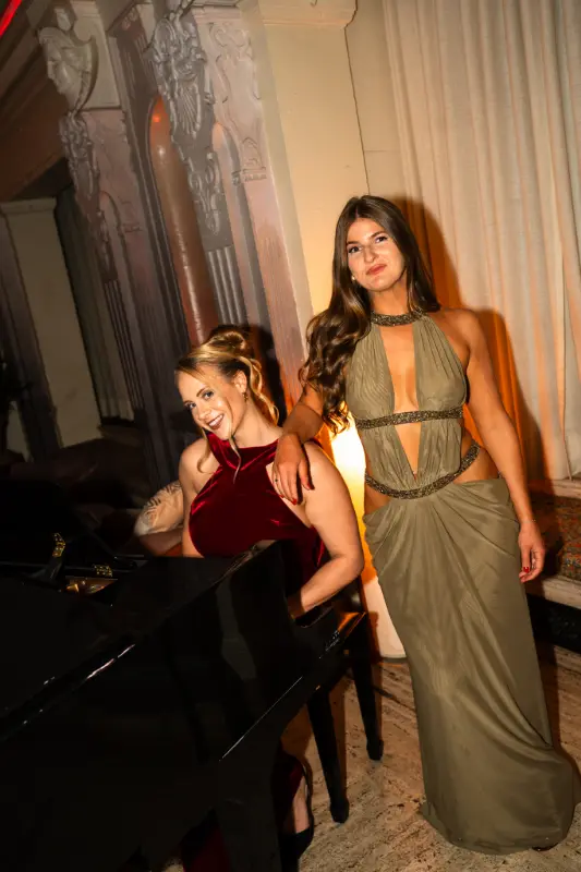 Two friends by the piano