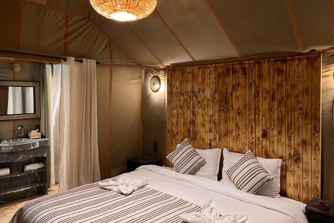 A double tent at Sahara Desert Luxury Camp