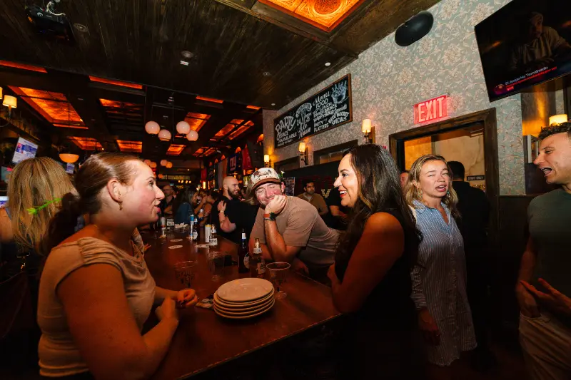 Catching up over drinks at the bar