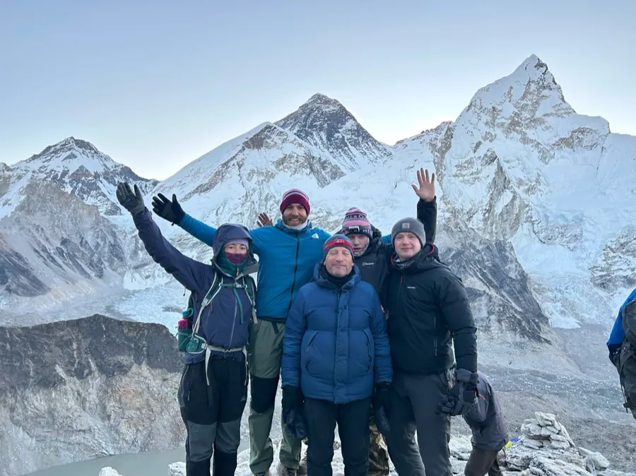 Hardest Adventures group at an Everest viewpoint on the Everest Base Camp trek in Nepal.
