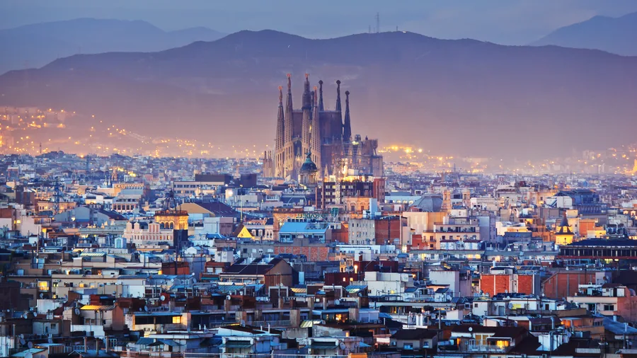 Barcelona skyline at dusk with the Sagrada Familia, the night before the Barcelona Marathon.
