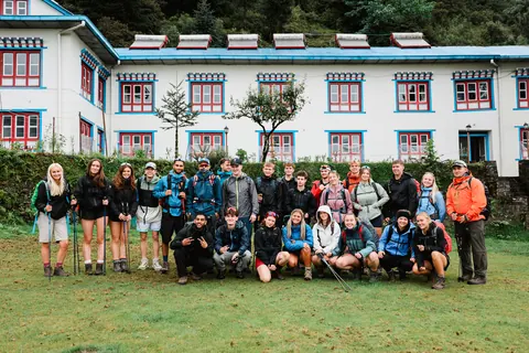 The full Hardest Adventures group outside their lodge in Lukla at the start of the trek