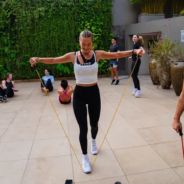 Group workout in a courtyard on the SYB Kenya trip