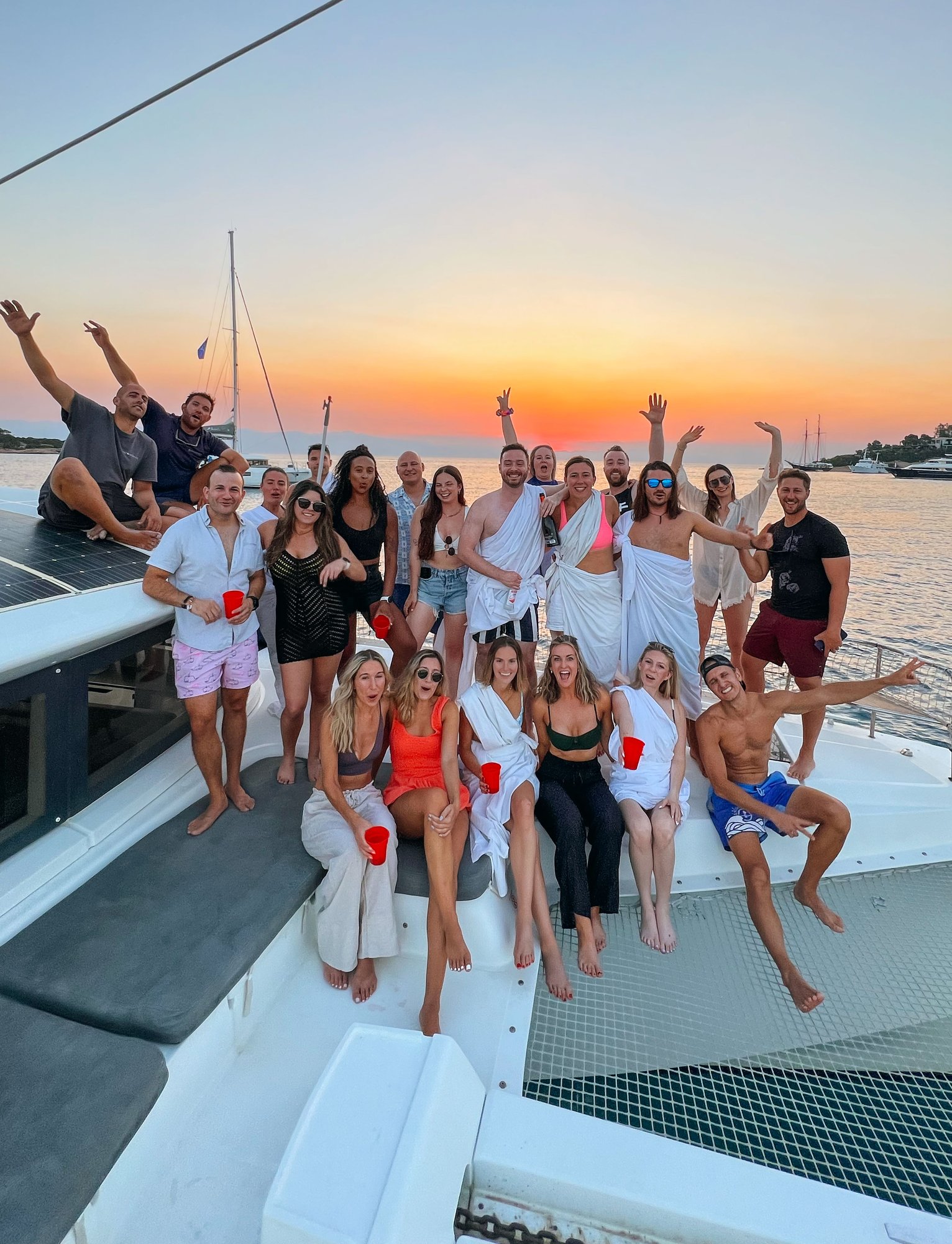 The crew on deck at golden hour