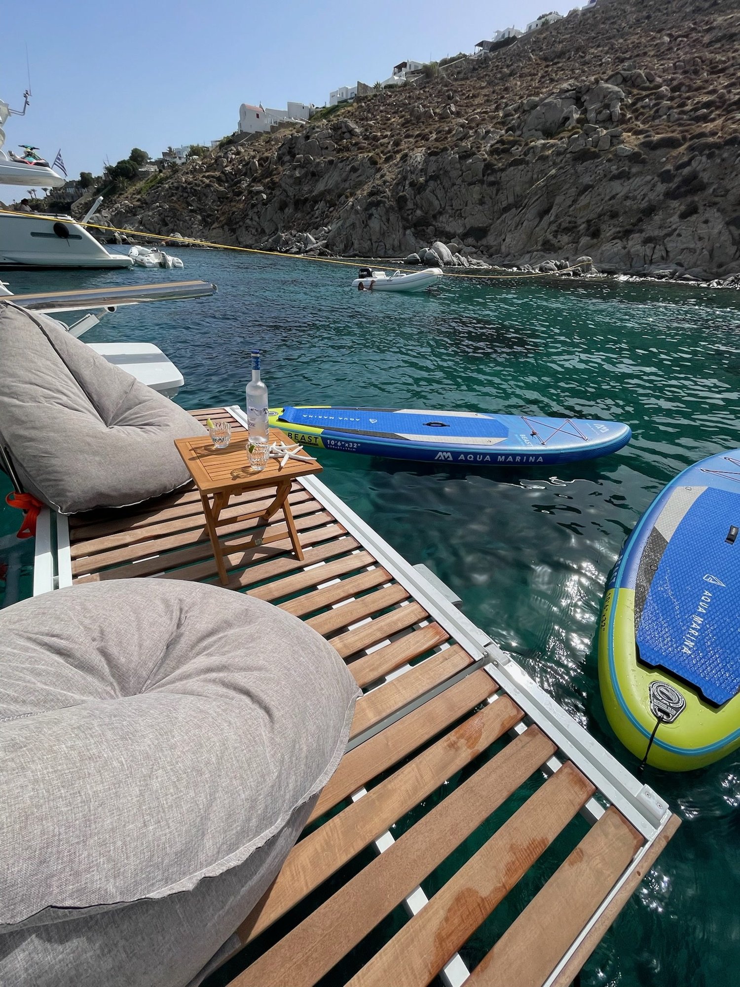 The paddleboard and sea scooter on the swim deck