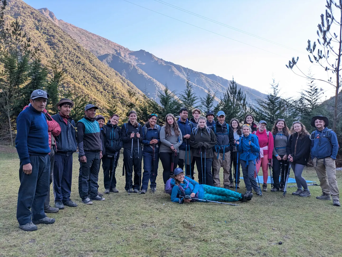 Group of Hardest Adventures trekkers below the snow-capped Salkantay pass on the trail to Machu Picchu.