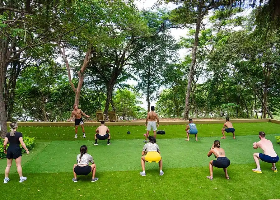 A group workout on the turf at the jungle gym