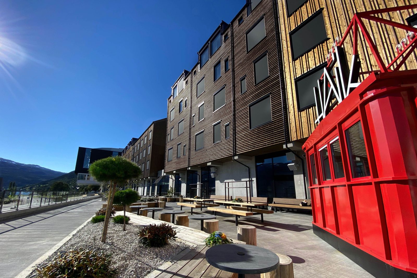 The Scandic Voss terrace in summer, next to the train station