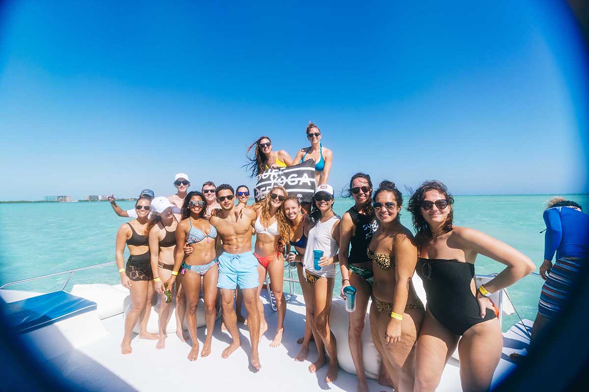 SurfYogaBeer boat day on the sandbar in Belize