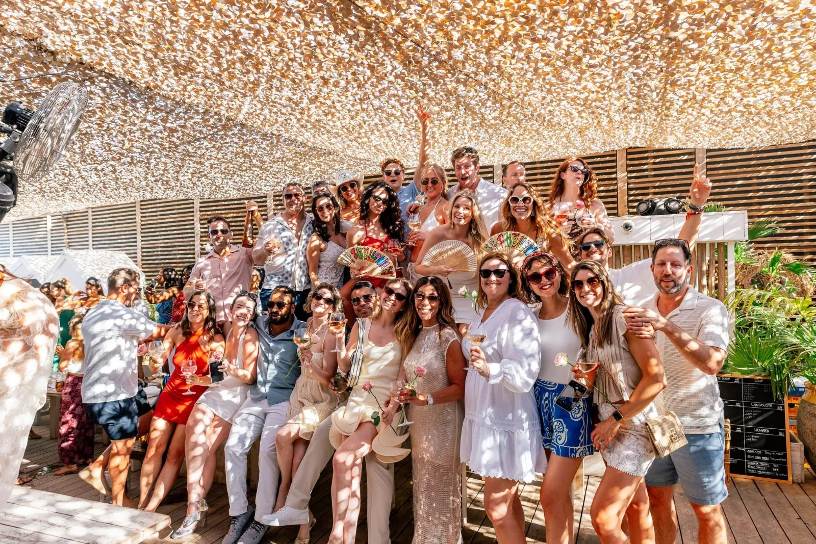 The SurfYogaBeer crew partying at the Fourth of July day club in Saint-Tropez