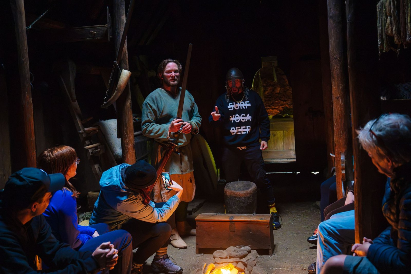 The SurfYogaBeer crew inside the Viking longhouse at Eiríksstaðir