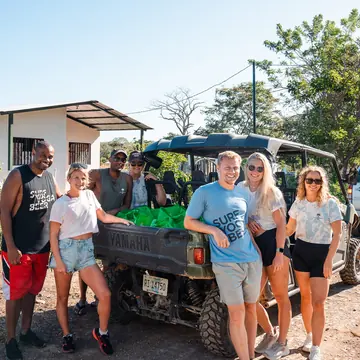 The crew heading out in an open top buggy