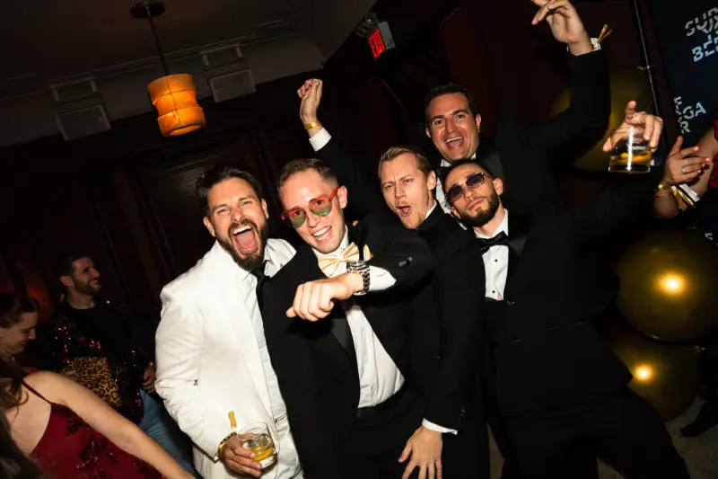 Friends in white dinner jackets